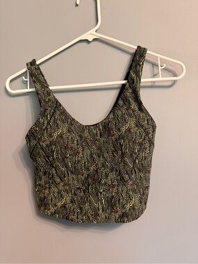 Calia Black Crop Tank with Olive Leaf Motif and Subtle Red Accents